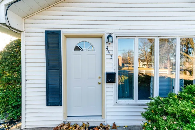 a front view of a house with a porch