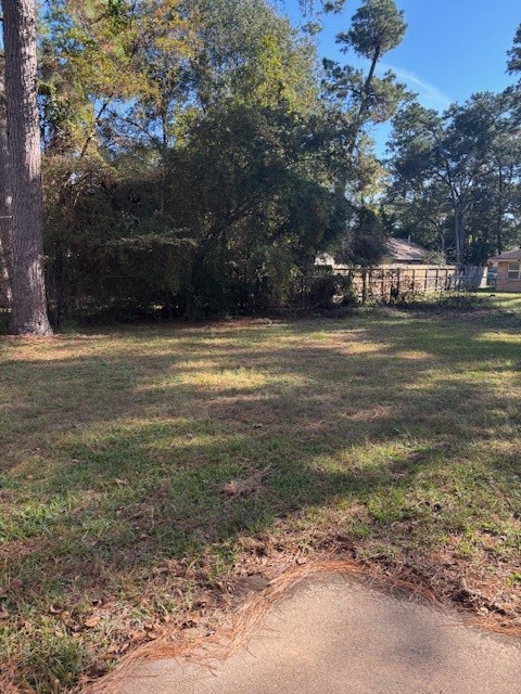 3303 Brooktree Lane Spring, TX 77380 - Photo 15 of 15 a view of a yard with large trees