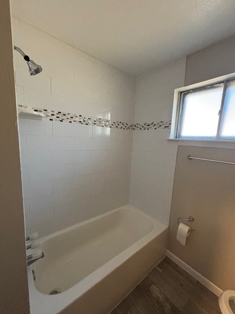 3303 Brooktree Lane Spring, TX 77380 - Photo 6 of 15 a bath tub sitting next to a white sink and vanity