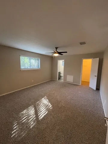 a view of a room with racks on the wall