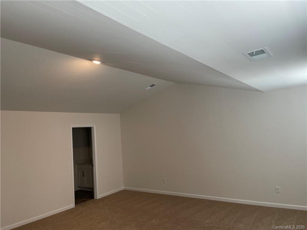5005 Traynor Road, Unit 18 Charlotte, NC 28216 - Photo 21 of 35 a view of an empty room