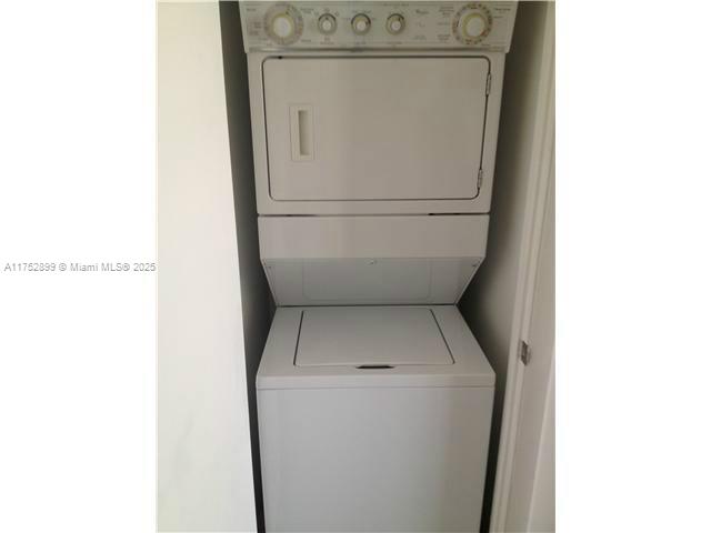50 Biscayne Boulevard, Unit 4105 Miami, FL 33132 - Photo 15 of 41 a utility room with dryer and washer
