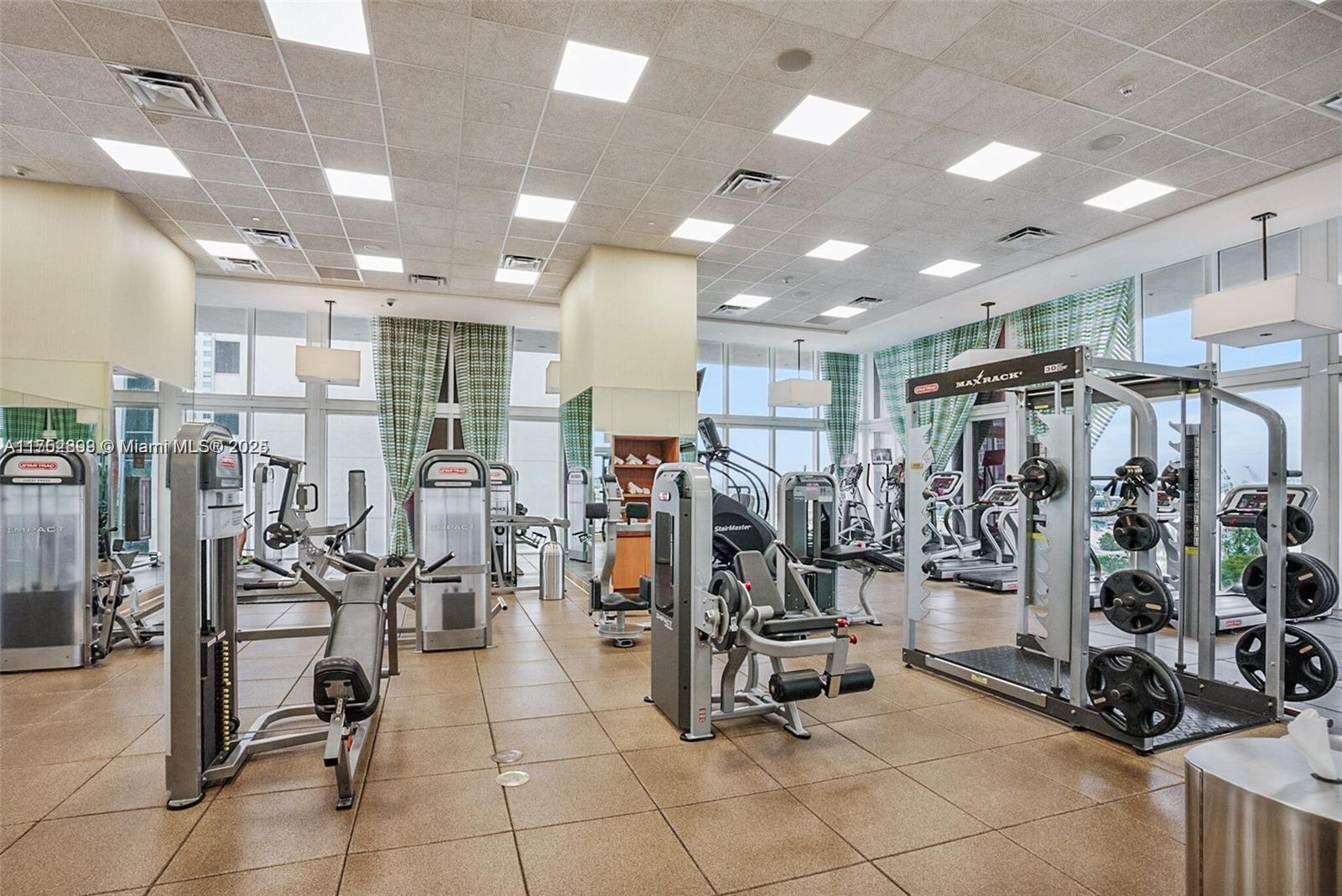 50 Biscayne Boulevard, Unit 4105 Miami, FL 33132 - Photo 16 of 41 a view of a room with gym equipment