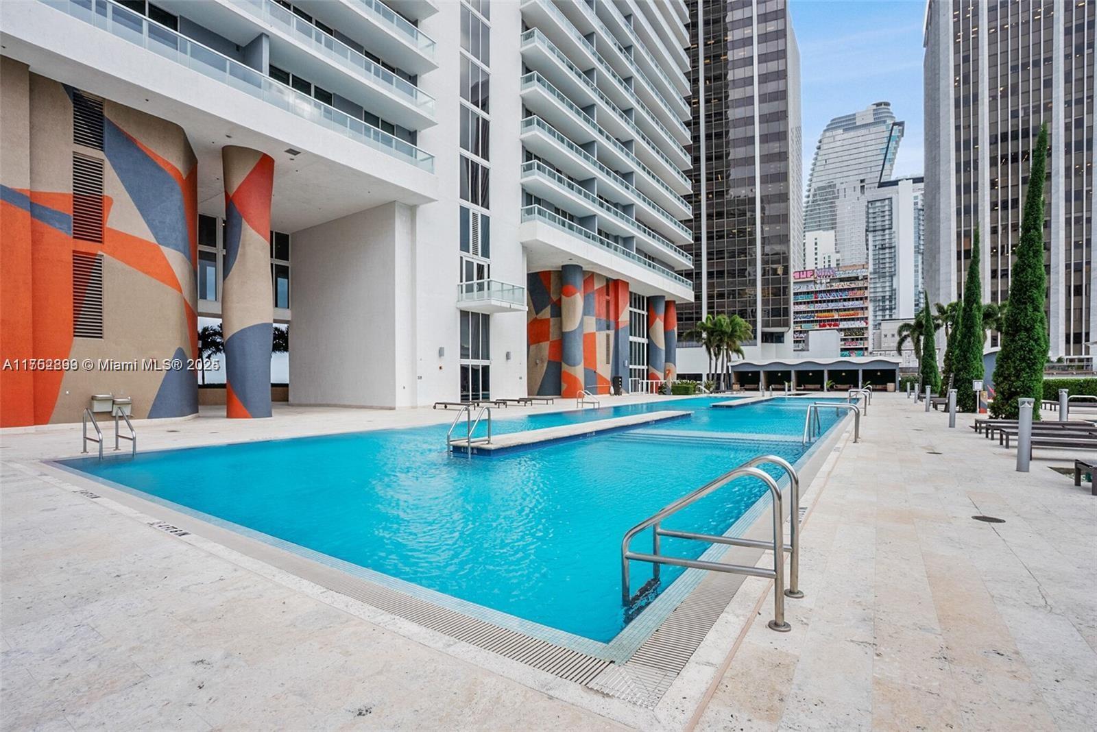 50 Biscayne Boulevard, Unit 4105 Miami, FL 33132 - Photo 21 of 41 swimming pool with outdoor seating