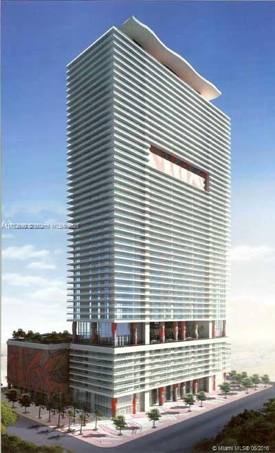 50 Biscayne Boulevard, Unit 4105 Miami, FL 33132 - Photo 28 of 41 a front view of a building with glass windows