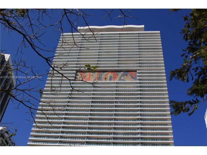 50 Biscayne Boulevard, Unit 4105 Miami, FL 33132 - Photo 29 of 41 a front view of a building with garden
