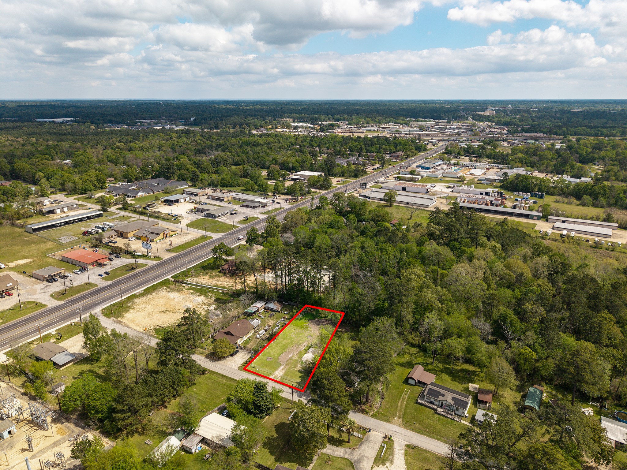 167 Walnut Hill Road Hudson, TX 75904 - Photo 3 of 6 an aerial view of residential building with outdoor space