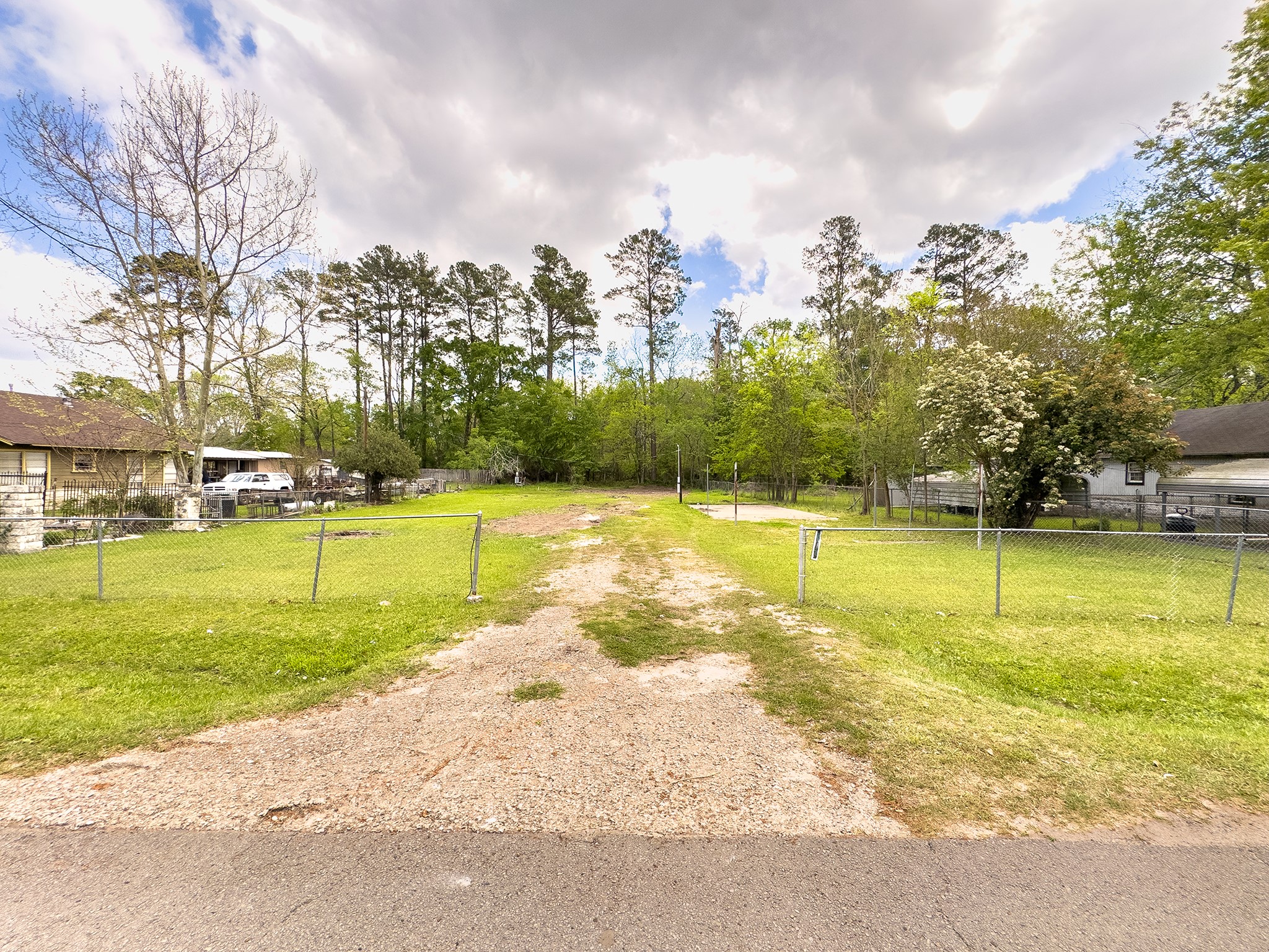 167 Walnut Hill Road Hudson, TX 75904 - Photo 6 of 6 a view of a swimming pool and a yard