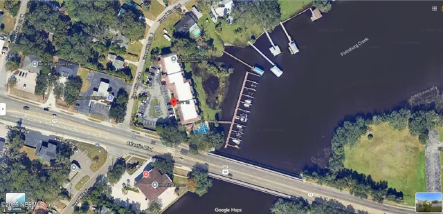 a kitchen with a refrigerator sink and stove