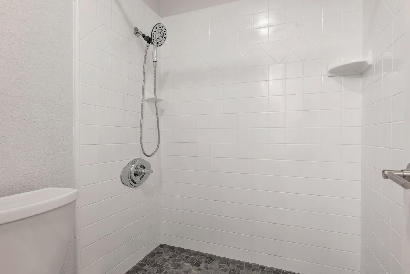 546 Shadowgraph Drive San Jose, CA 95110 - Photo 14 of 24 a bathroom with a shower