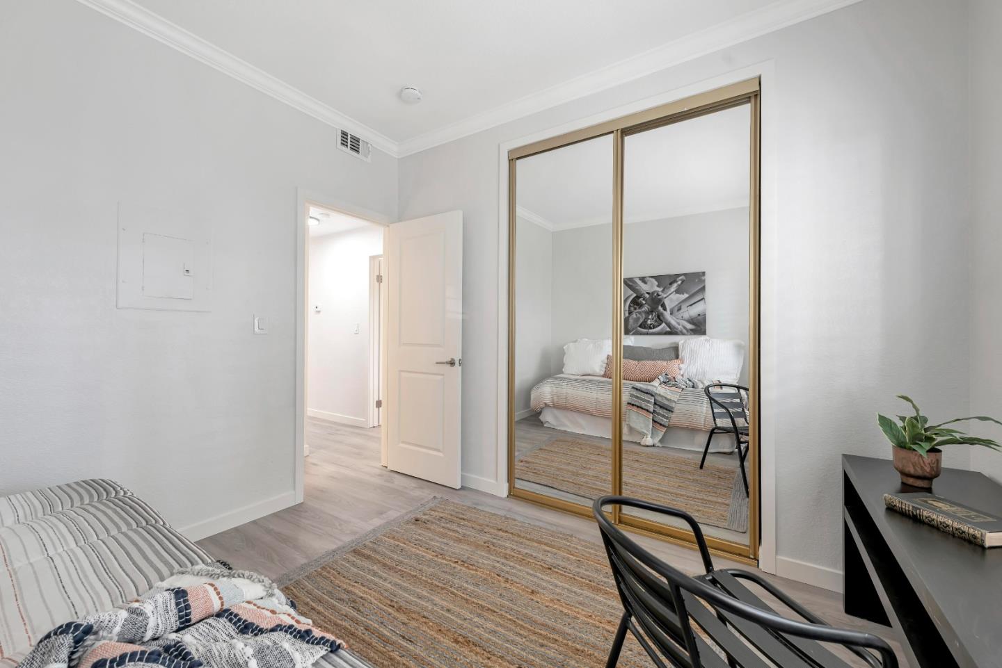 546 Shadowgraph Drive San Jose, CA 95110 - Photo 17 of 24 a view of a livingroom with furniture and hardwood floor