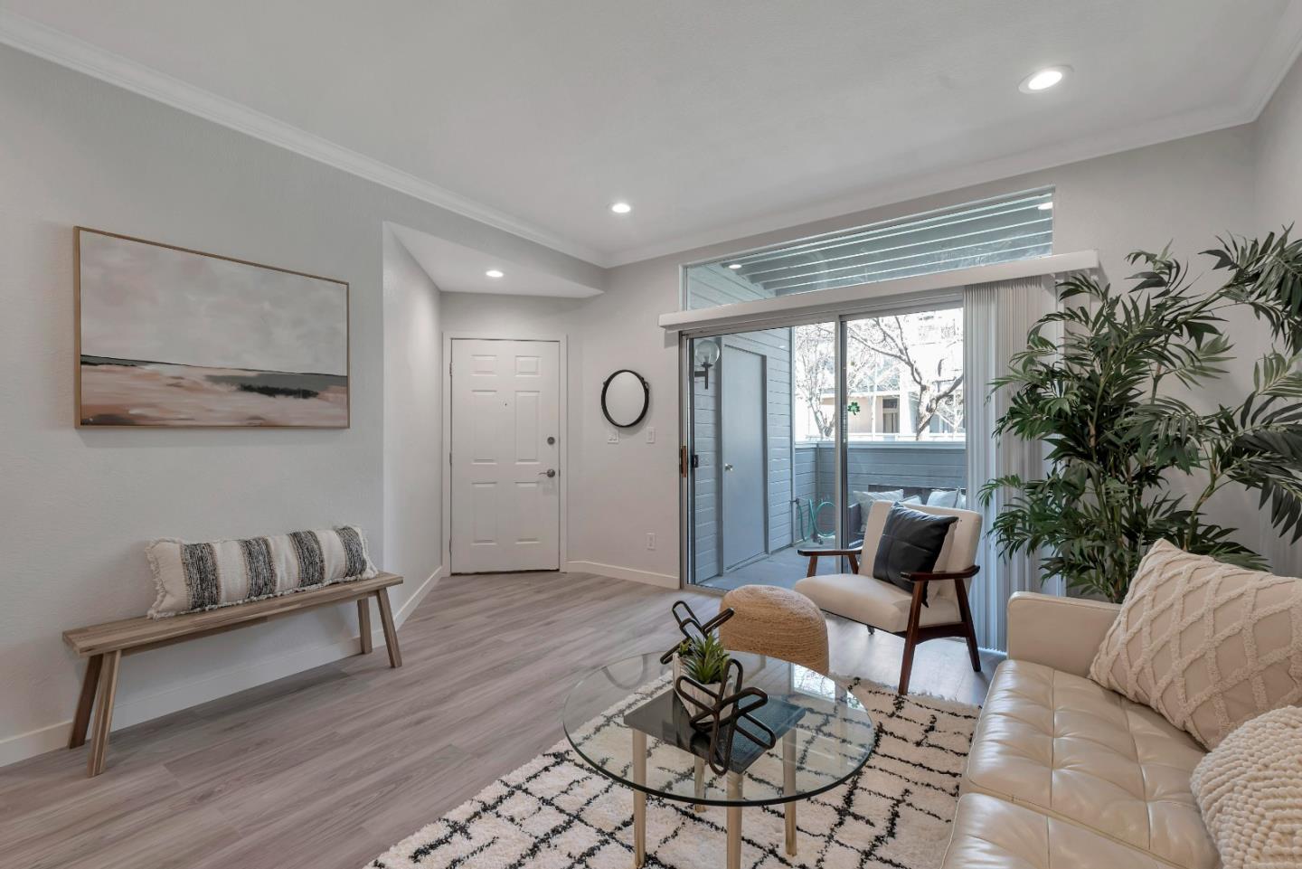 546 Shadowgraph Drive San Jose, CA 95110 - Photo 3 of 24 a living room with furniture and a potted plant