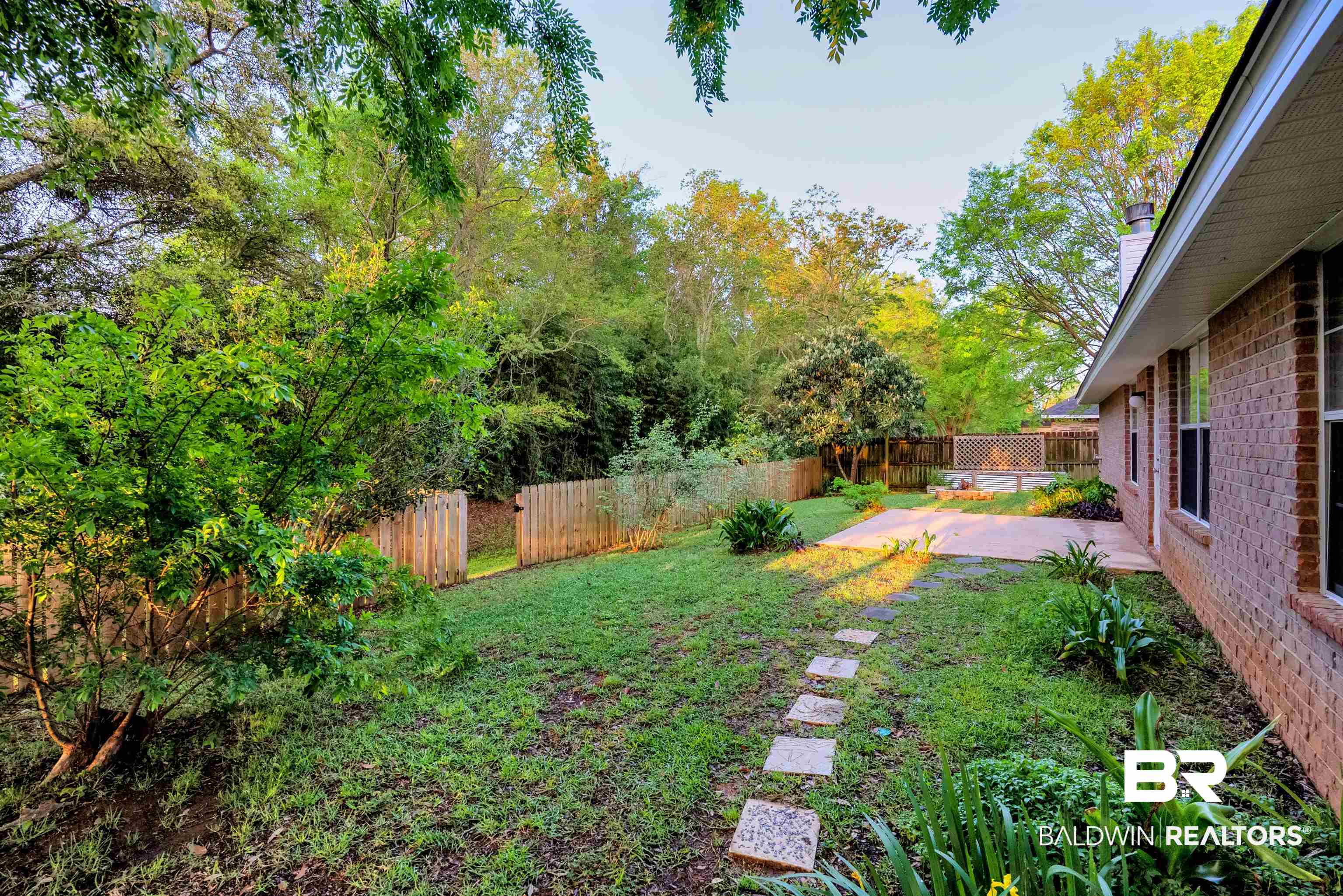 165 Pemberton Loop Fairhope, AL 36532 - Photo 20 of 25 View of yard with a patio and a fenced backyard