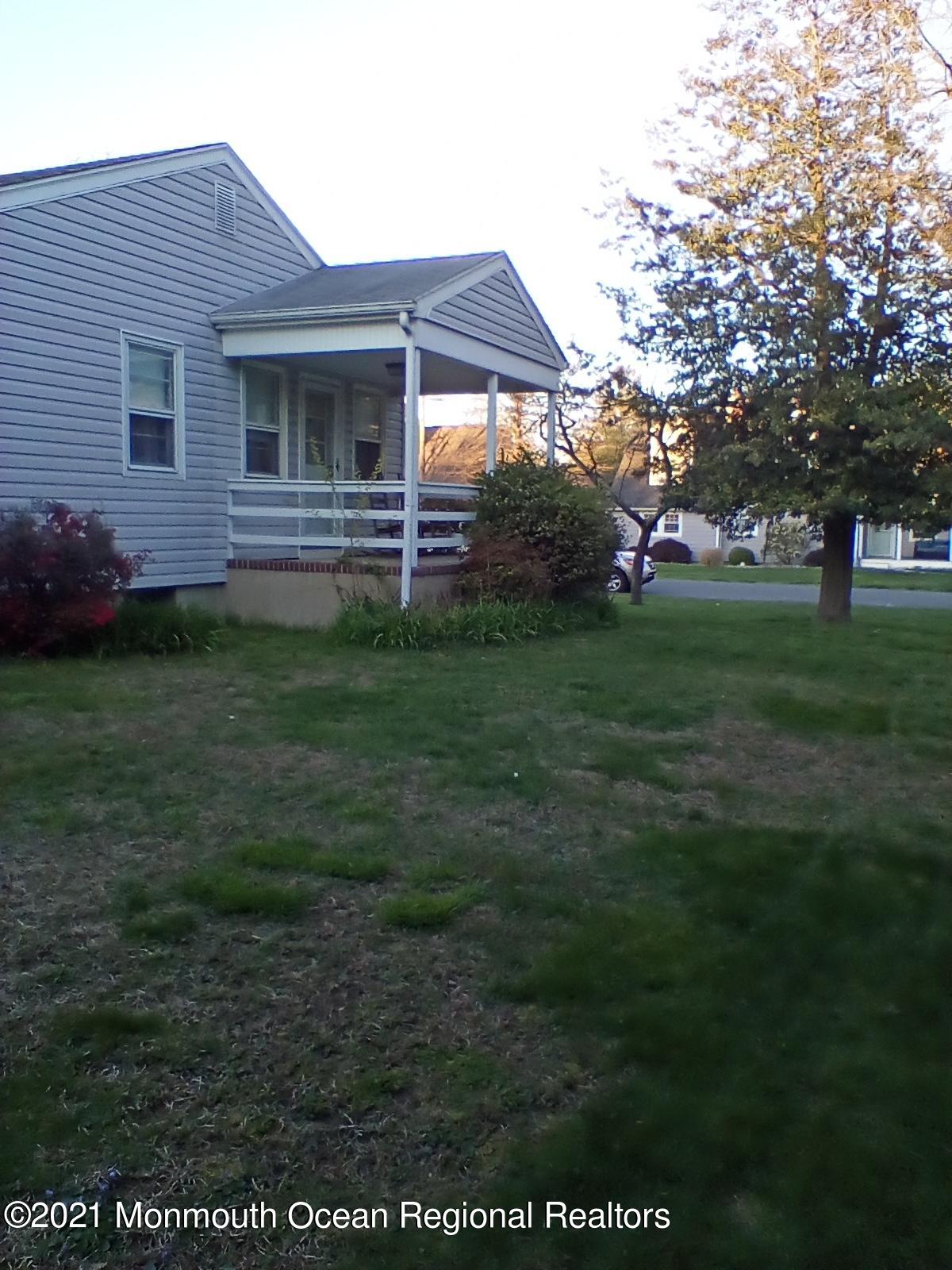 1623 Bailey Road Wall, NJ 07719 - Photo 3 of 14 a front view of a house with garden