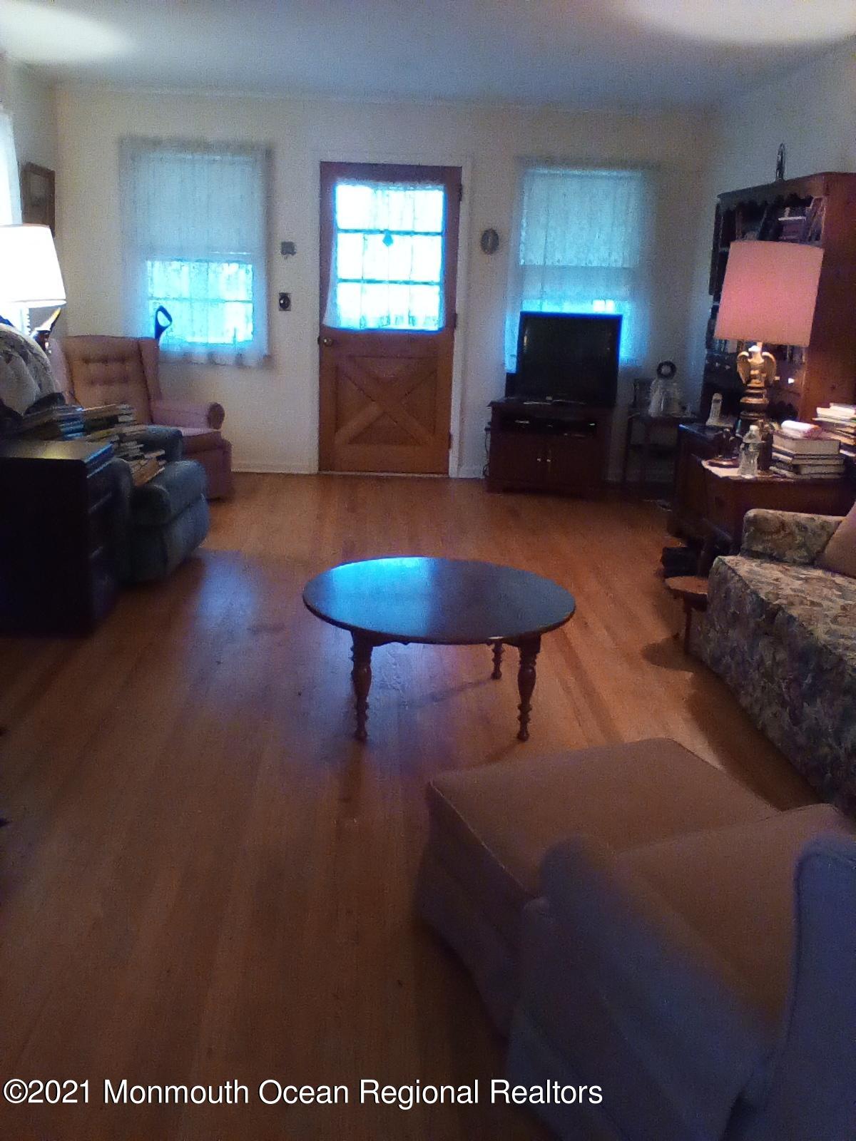 1623 Bailey Road Wall, NJ 07719 - Photo 6 of 14 a living room with furniture and a window