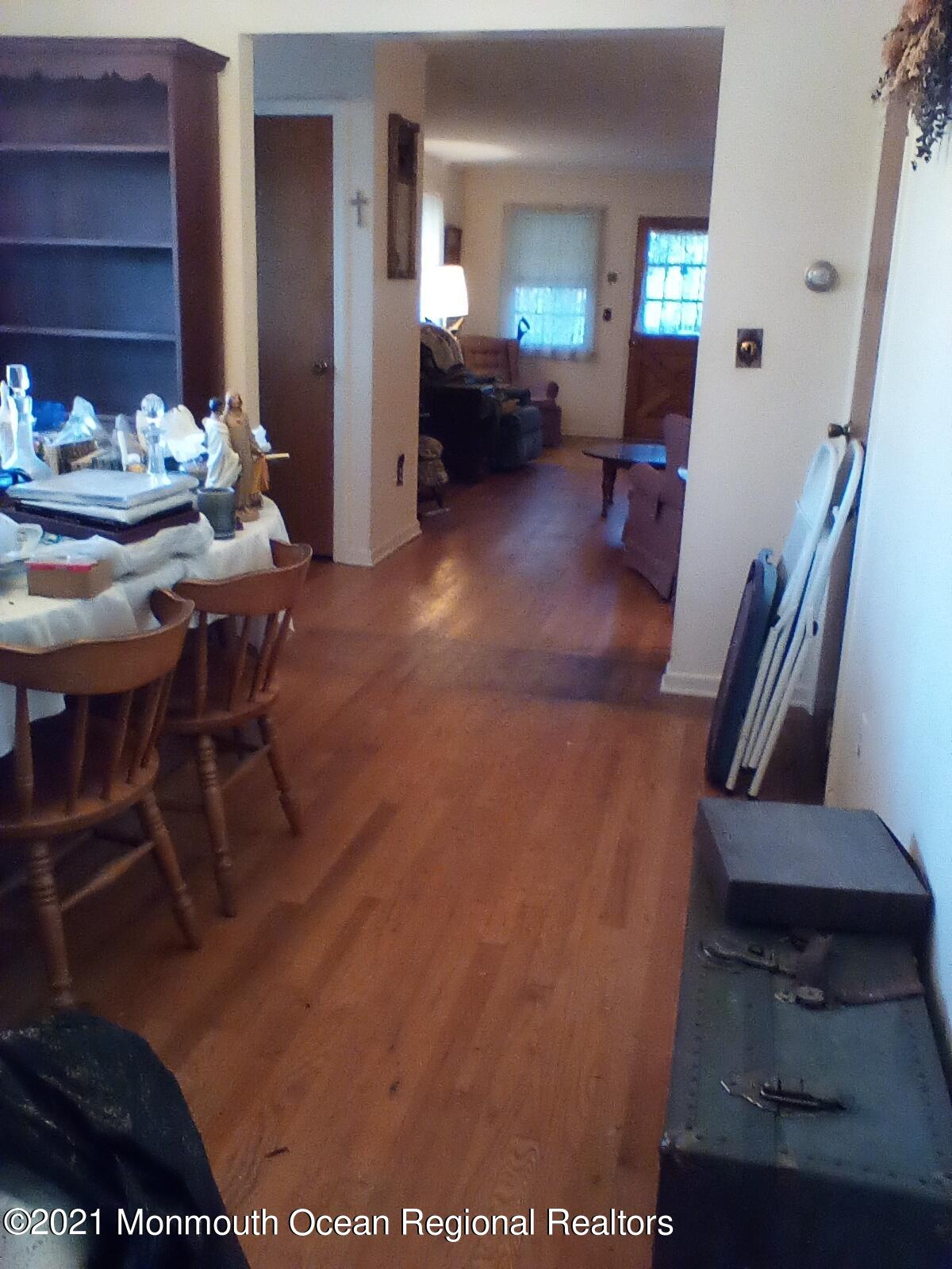 1623 Bailey Road Wall, NJ 07719 - Photo 10 of 14 a living room with furniture and a table