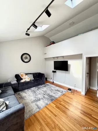 a kitchen with a table and chairs