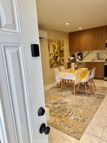 a view of a dining room with furniture