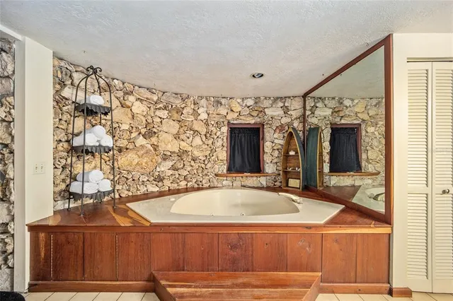 a view of swimming pool with an outdoor space and seating area