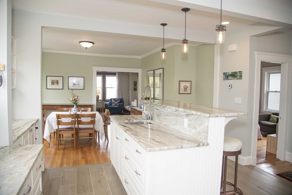 3 Chester Road, Unit 3 Belmont, MA 02478 - Photo 8 of 40 a large kitchen with a table and chairs