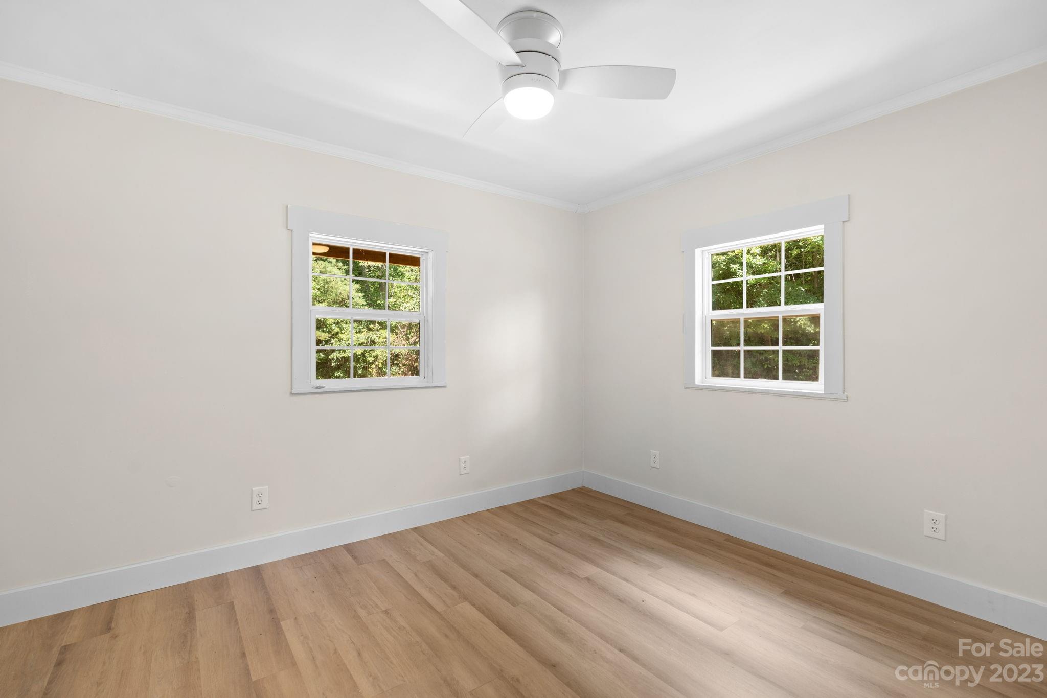 632 Thunder Road Clyde, NC 28721 - Photo 20 of 41 an empty room with a window