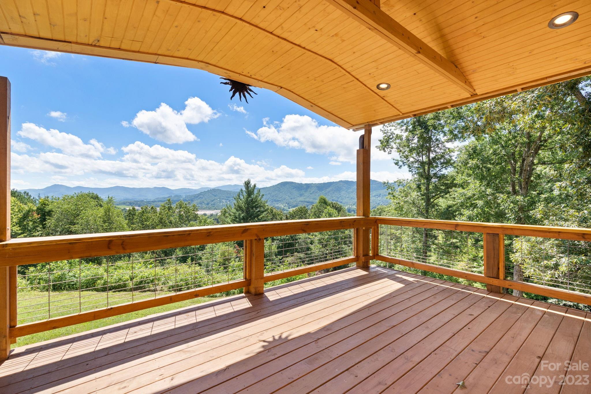 632 Thunder Road Clyde, NC 28721 - Photo 4 of 41 a view of city with a balcony