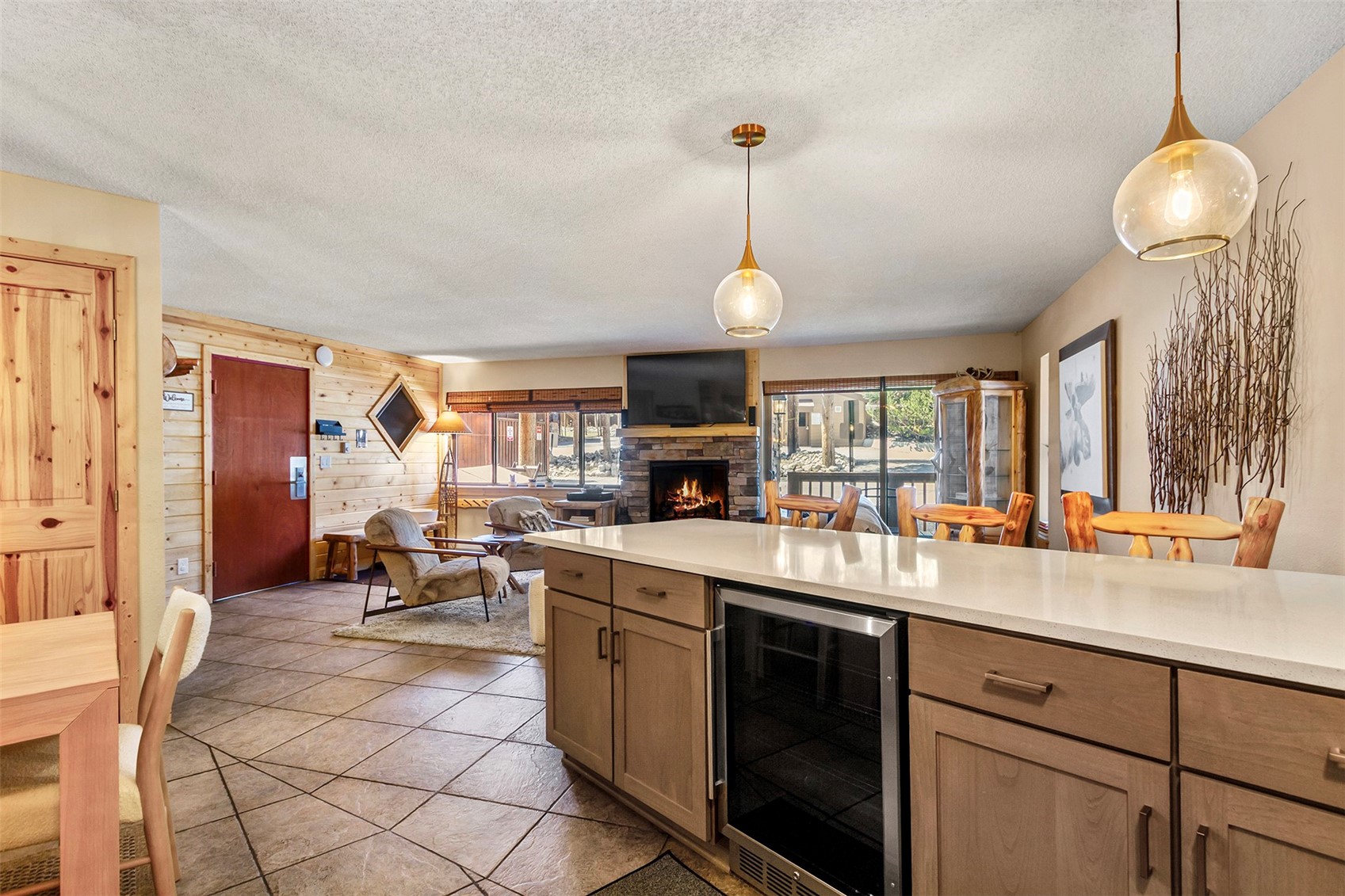 405 4 O Clock Road, Unit 15A Breckenridge, CO 80424 - Photo 14 of 50 a kitchen with stainless steel appliances granite countertop a stove a sink and a refrigerator