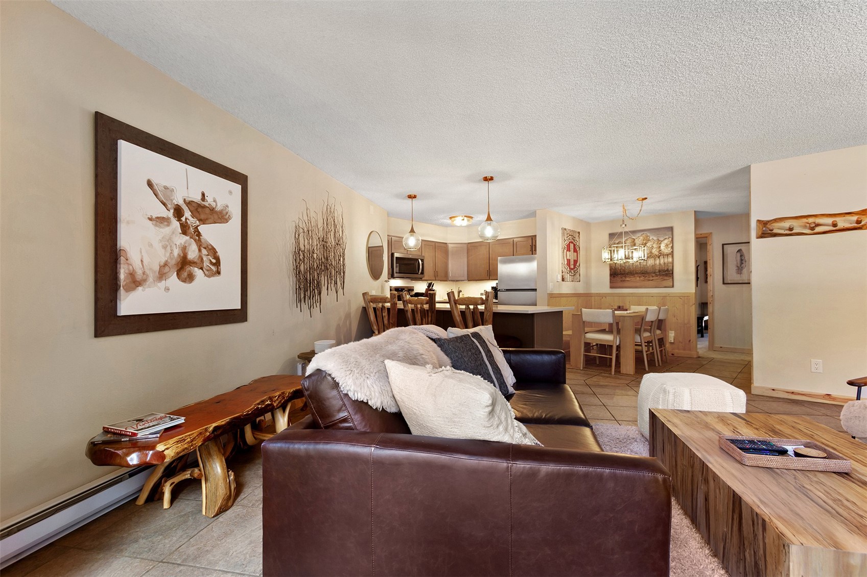 405 4 O Clock Road, Unit 15A Breckenridge, CO 80424 - Photo 17 of 50 a living room with furniture and a window