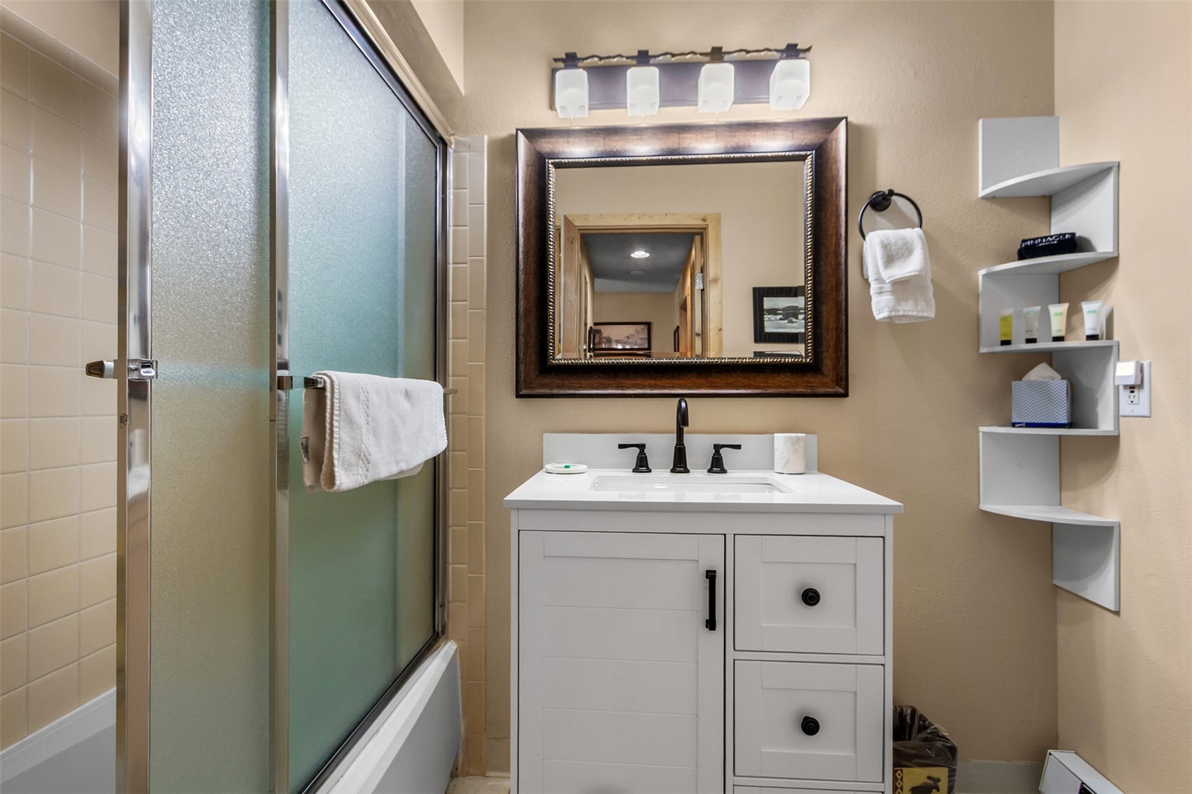 405 4 O Clock Road, Unit 15A Breckenridge, CO 80424 - Photo 33 of 50 a bathroom with a sink vanity and mirror