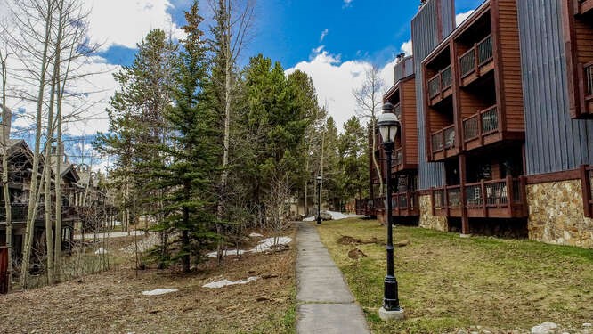 405 4 O Clock Road, Unit 15A Breckenridge, CO 80424 - Photo 41 of 50 a view of a house with a yard