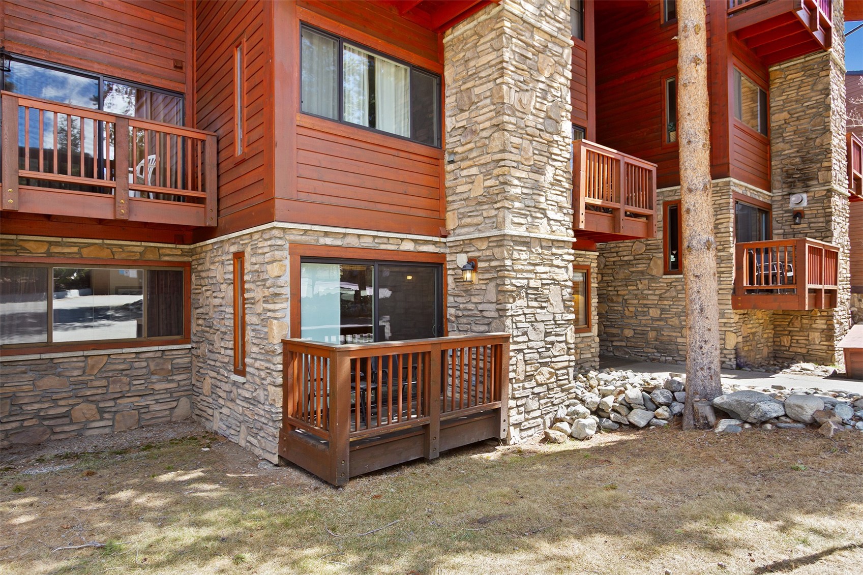405 4 O Clock Road, Unit 15A Breckenridge, CO 80424 - Photo 45 of 50 a view of a house with a yard