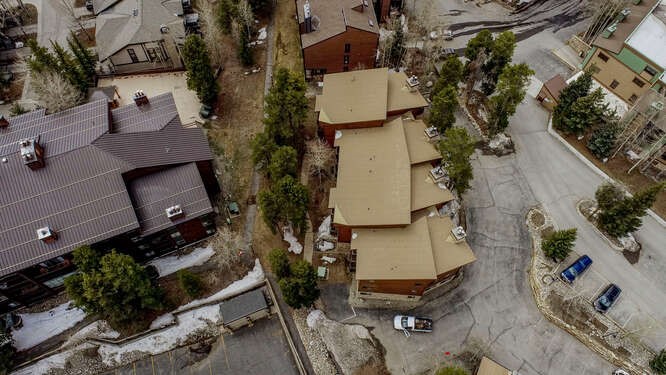 405 4 O Clock Road, Unit 15A Breckenridge, CO 80424 - Photo 46 of 50 an aerial view of residential house with outdoor space and parking
