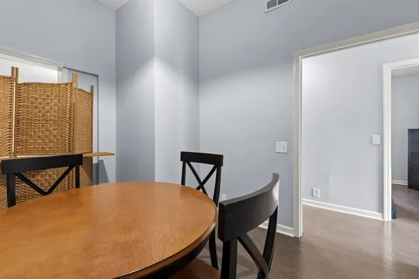 a view of a dining room with furniture