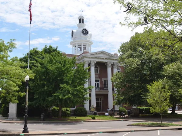 front view of a building with a yard
