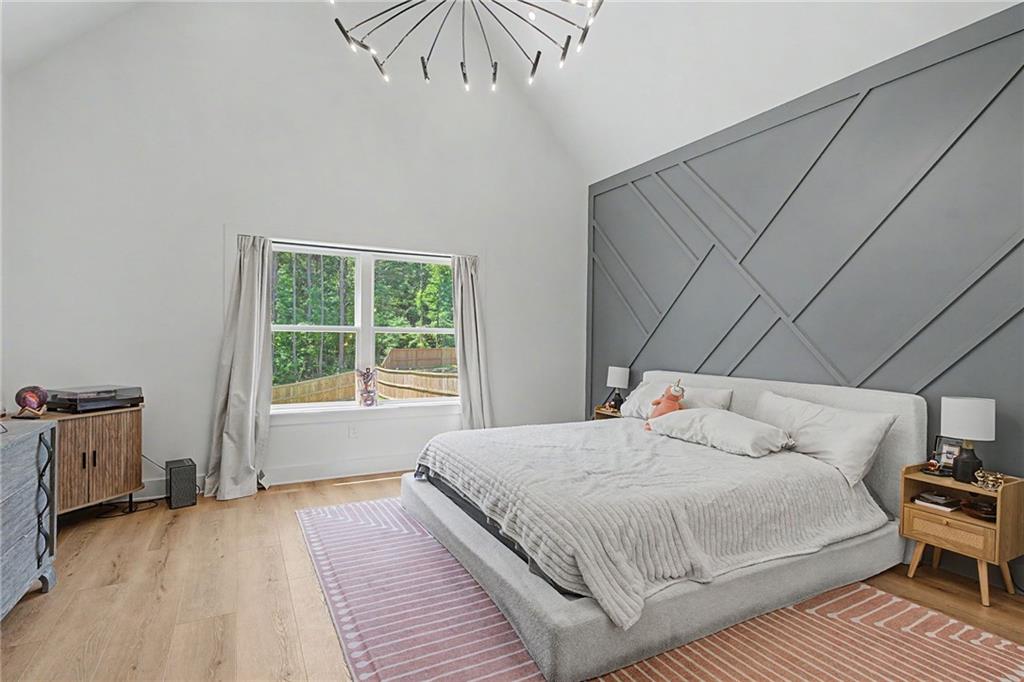 376 Hunnicut Road Southeast Mableton, GA 30126 - Photo 28 of 73 a bedroom with a bed and a window