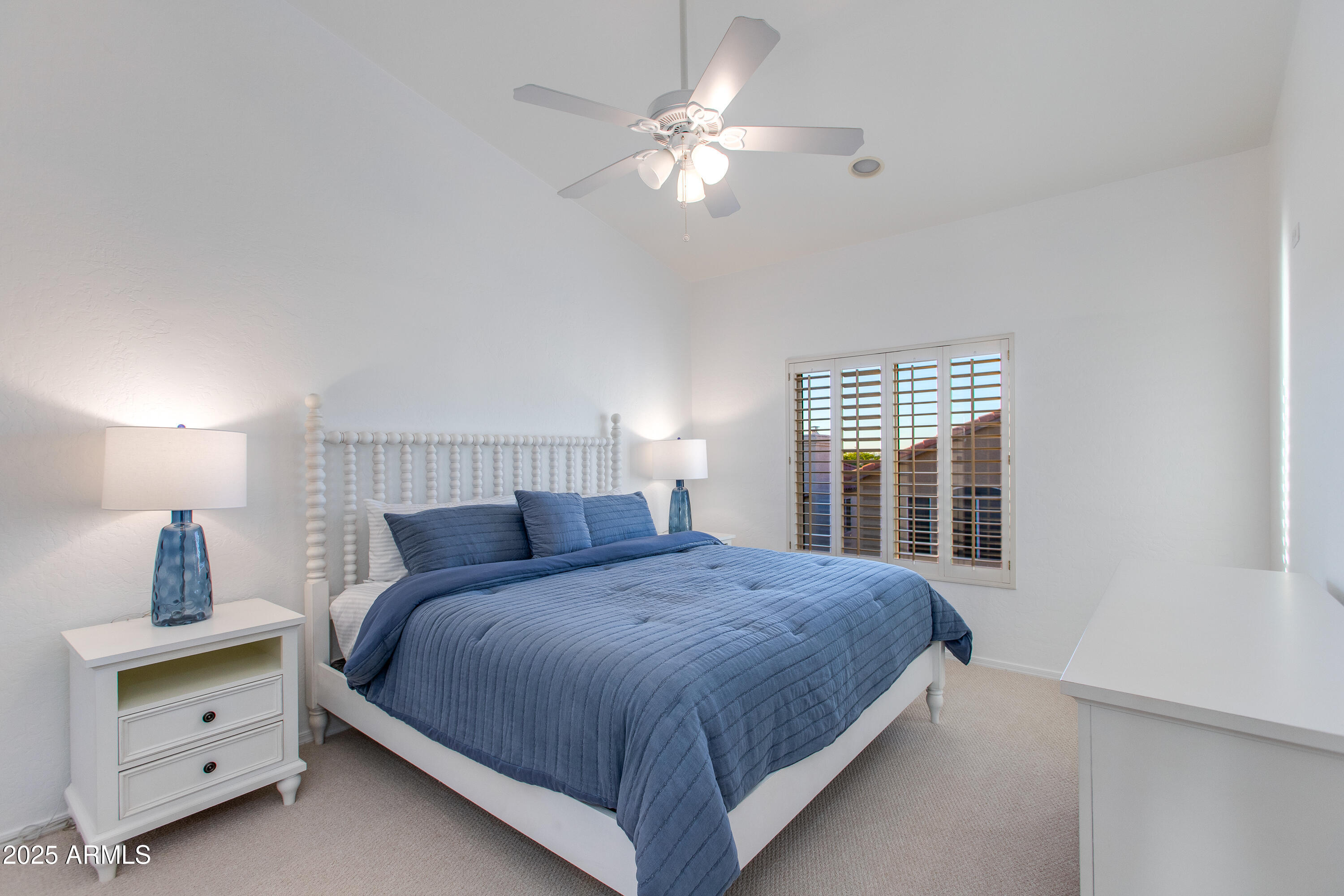 1331 East Voltaire Avenue Phoenix, AZ 85022 - Photo 19 of 33 a bedroom with a large bed and a window