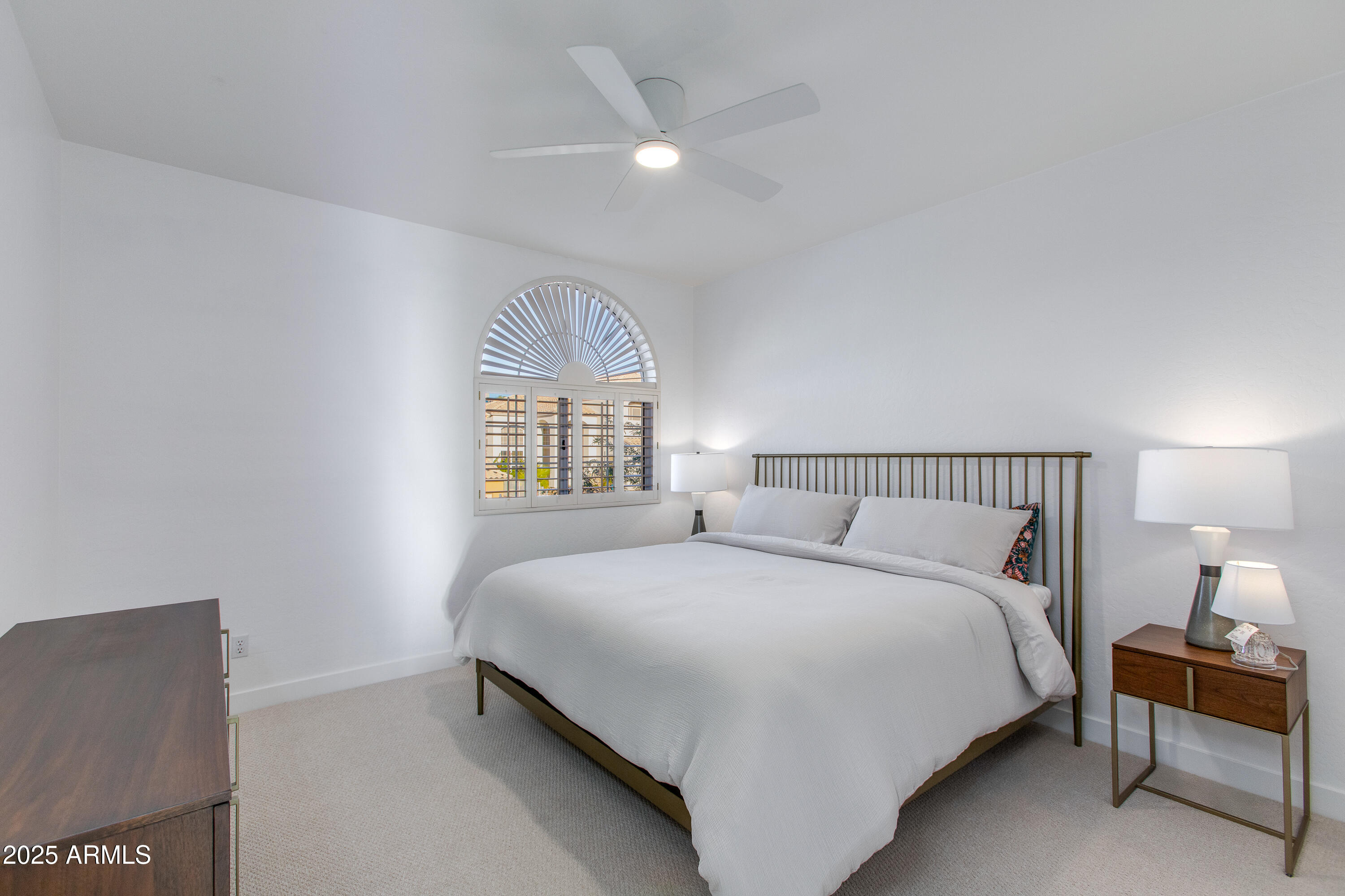 1331 East Voltaire Avenue Phoenix, AZ 85022 - Photo 21 of 33 a bedroom with a bed and a large window