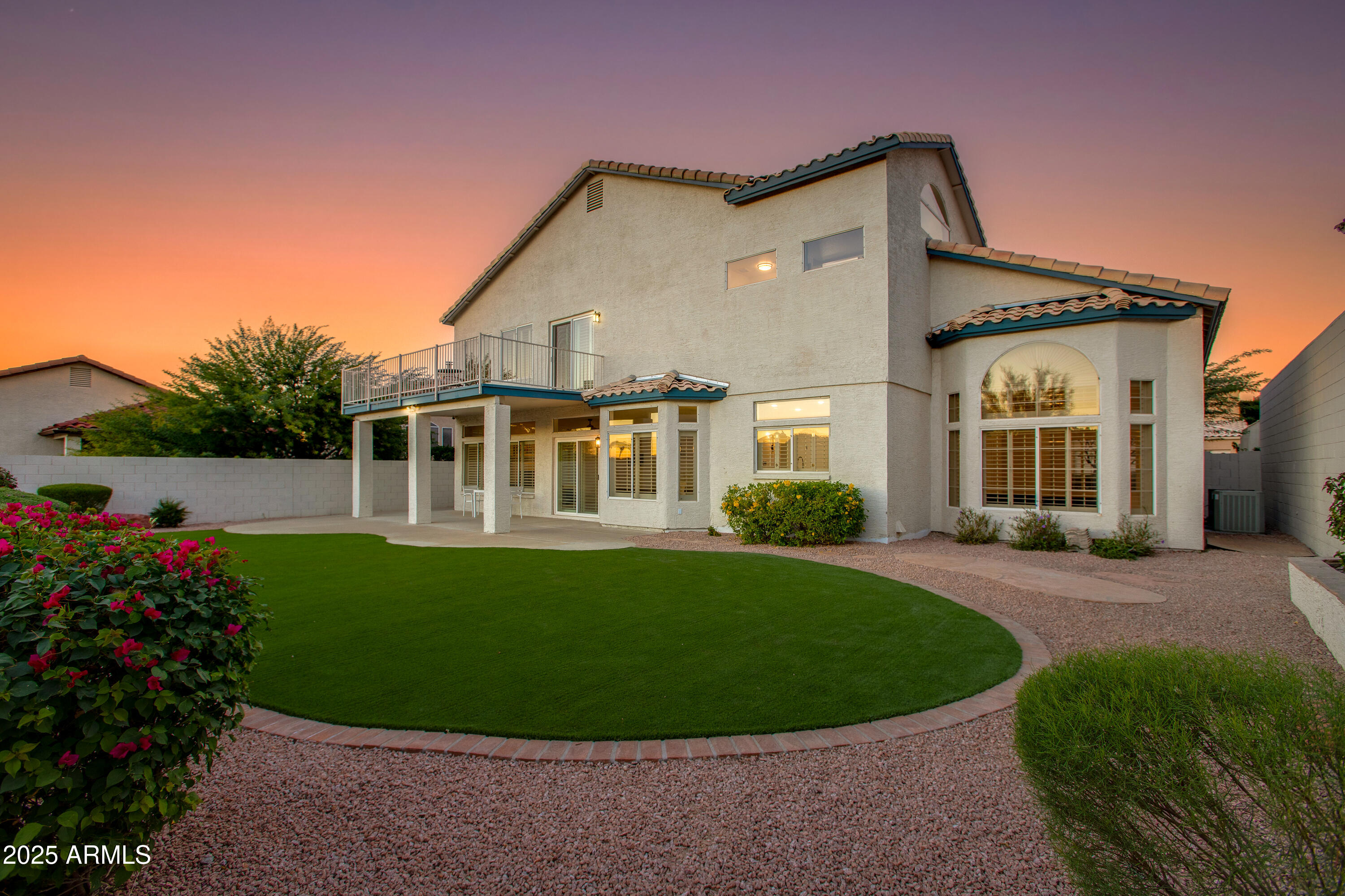 1331 East Voltaire Avenue Phoenix, AZ 85022 - Photo 28 of 33 a front view of a house with a garden