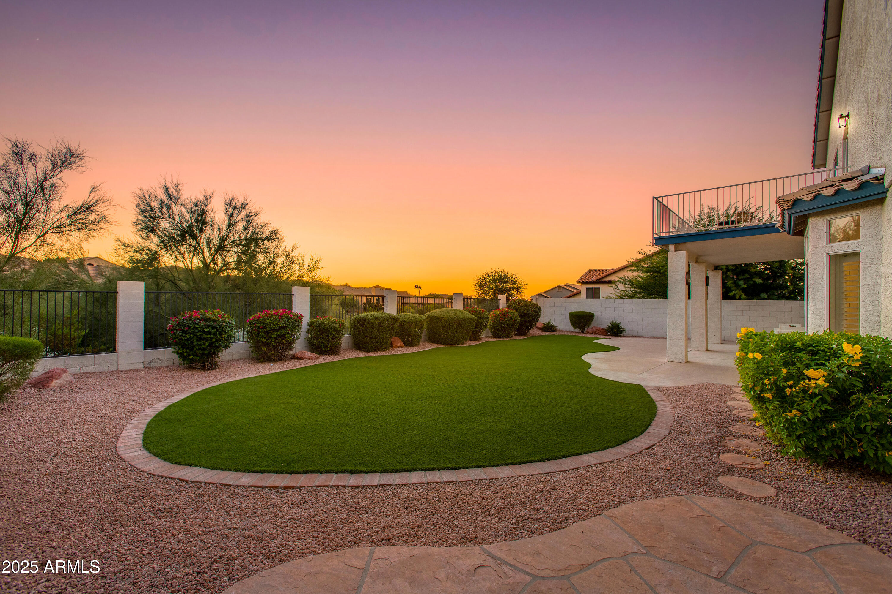 1331 East Voltaire Avenue Phoenix, AZ 85022 - Photo 30 of 33 a view of a house with a backyard