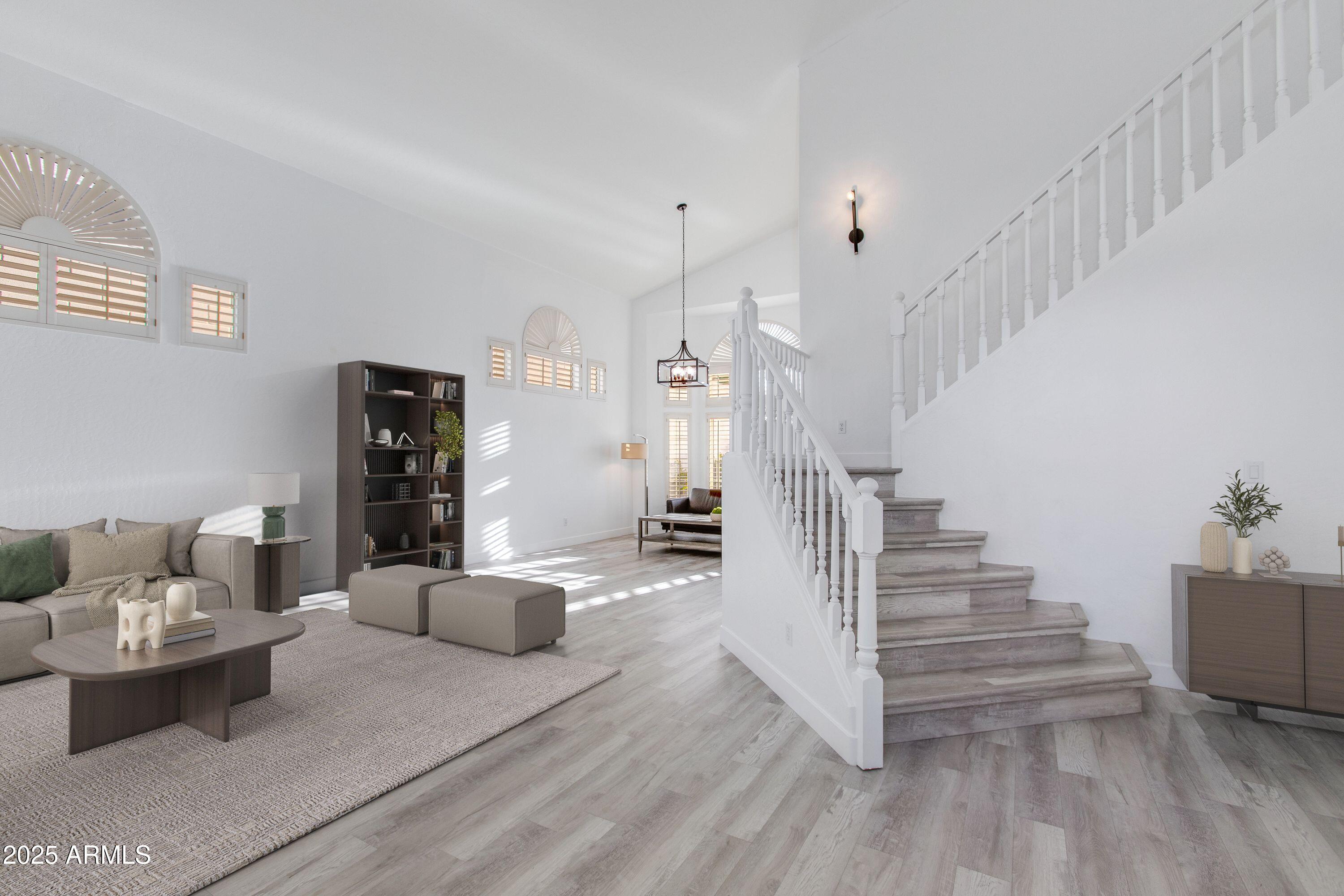 1331 East Voltaire Avenue Phoenix, AZ 85022 - Photo 3 of 33 a living room with furniture and wooden floor