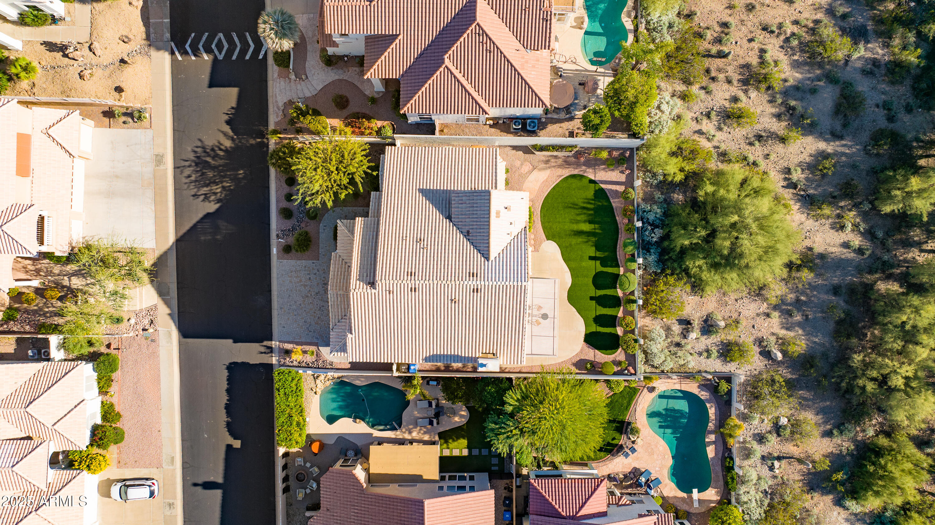 1331 East Voltaire Avenue Phoenix, AZ 85022 - Photo 33 of 33 an aerial view of a house with a swimming pool