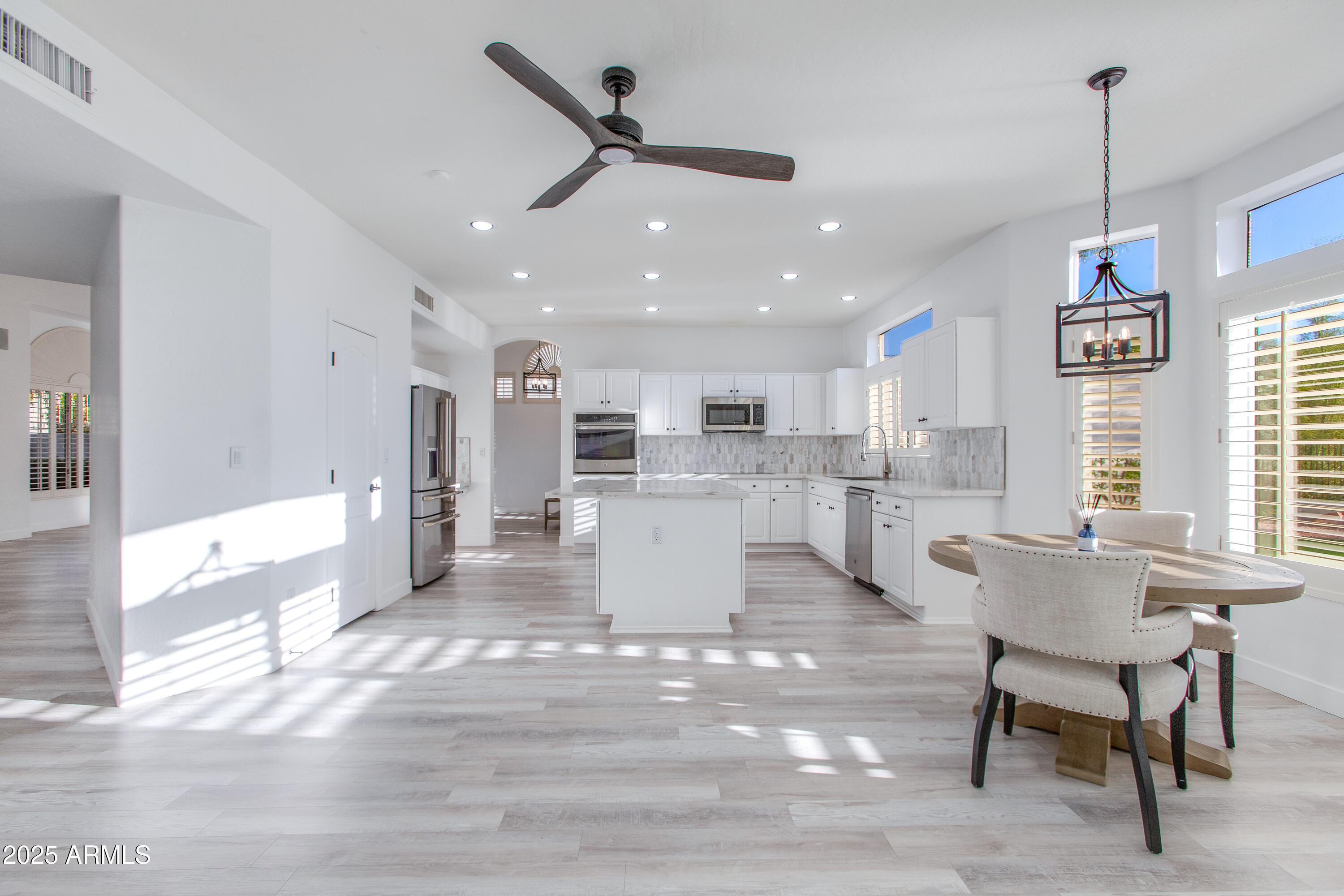 1331 East Voltaire Avenue Phoenix, AZ 85022 - Photo 7 of 33 a view of a kitchen and kitchen with stainless steel appliances