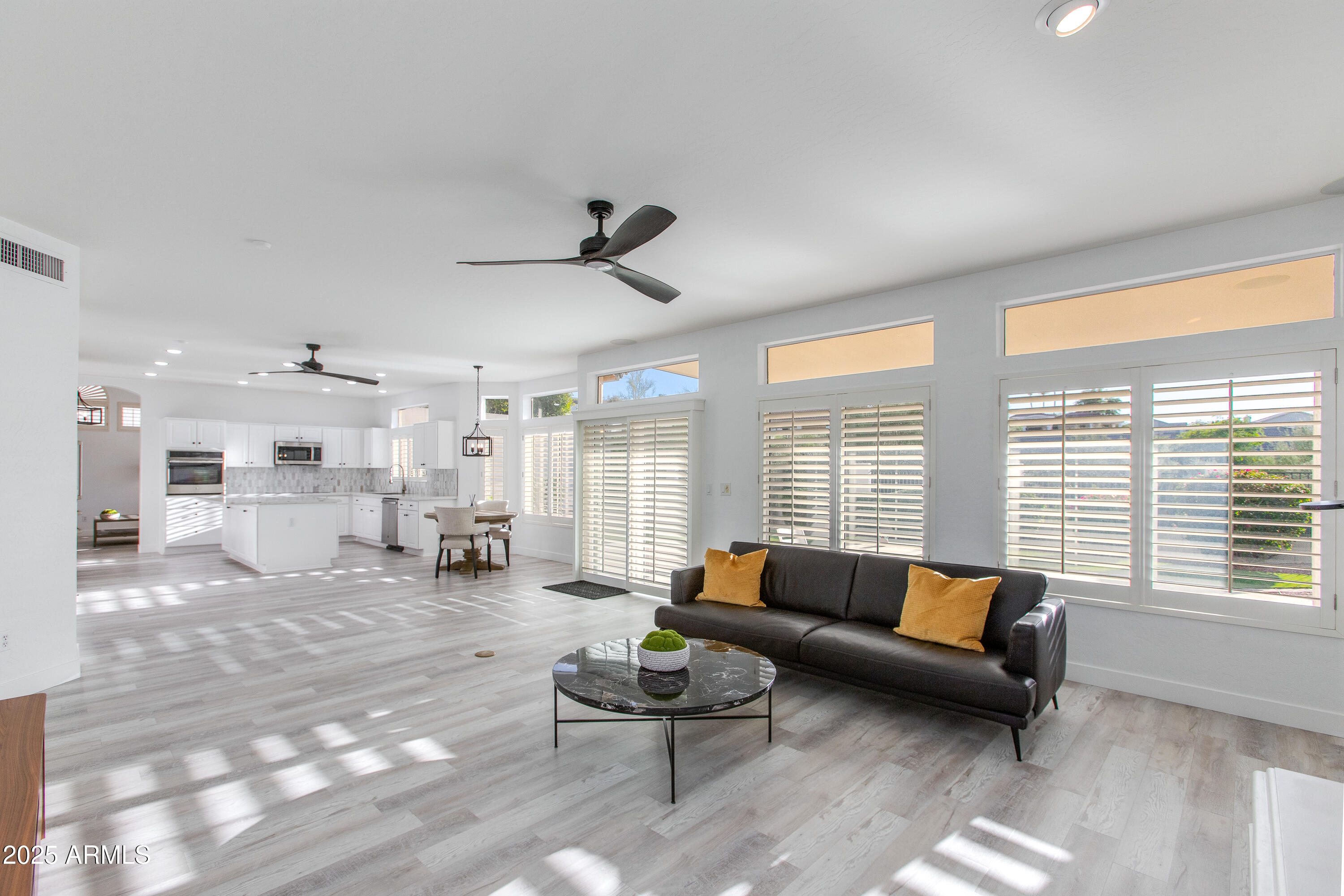 1331 East Voltaire Avenue Phoenix, AZ 85022 - Photo 8 of 33 a living room with furniture and a large window