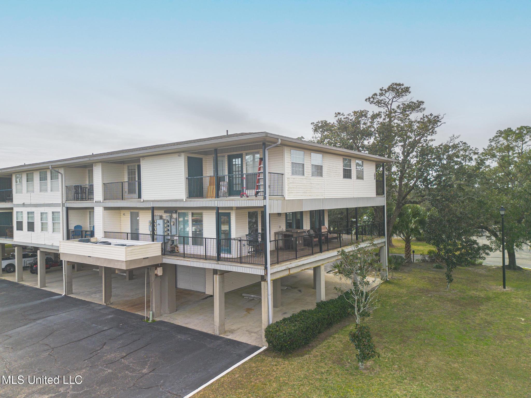 3230 Cumberland Road, Unit 201 Ocean Springs, MS 39564 - Photo 1 of 28 Front Photo