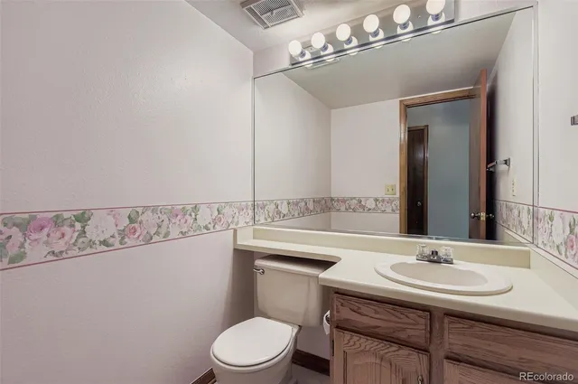 an empty room with a view of a bathroom