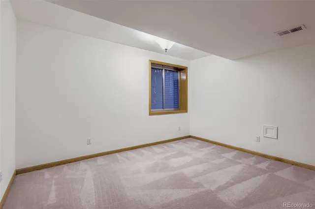 an aerial view of a house with yard