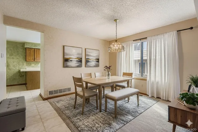 a view of a livingroom and dining room