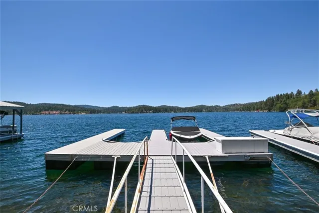 a view of a terrace with a table and chairs