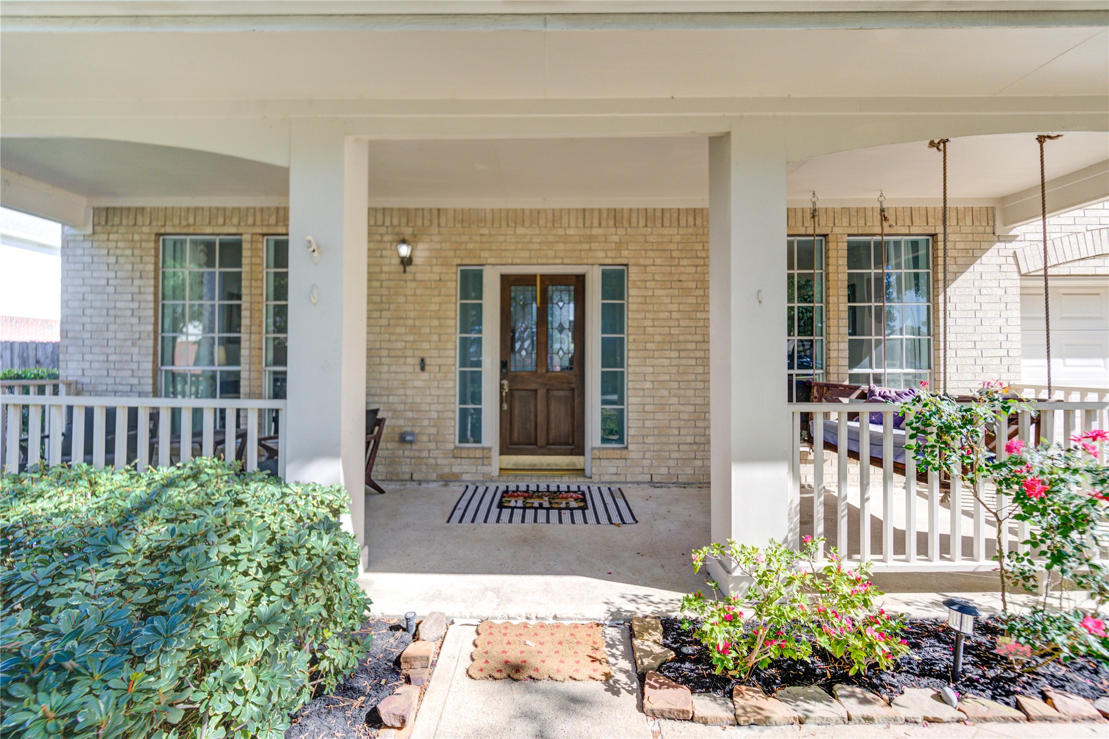 10906 Trail Ridge Drive Houston, TX 77064 - Photo 39 of 41 Charming covered entryway offering a peaceful spot to relax and enjoy the outdoors.