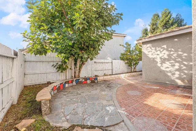 an aerial view of a house with a lake view